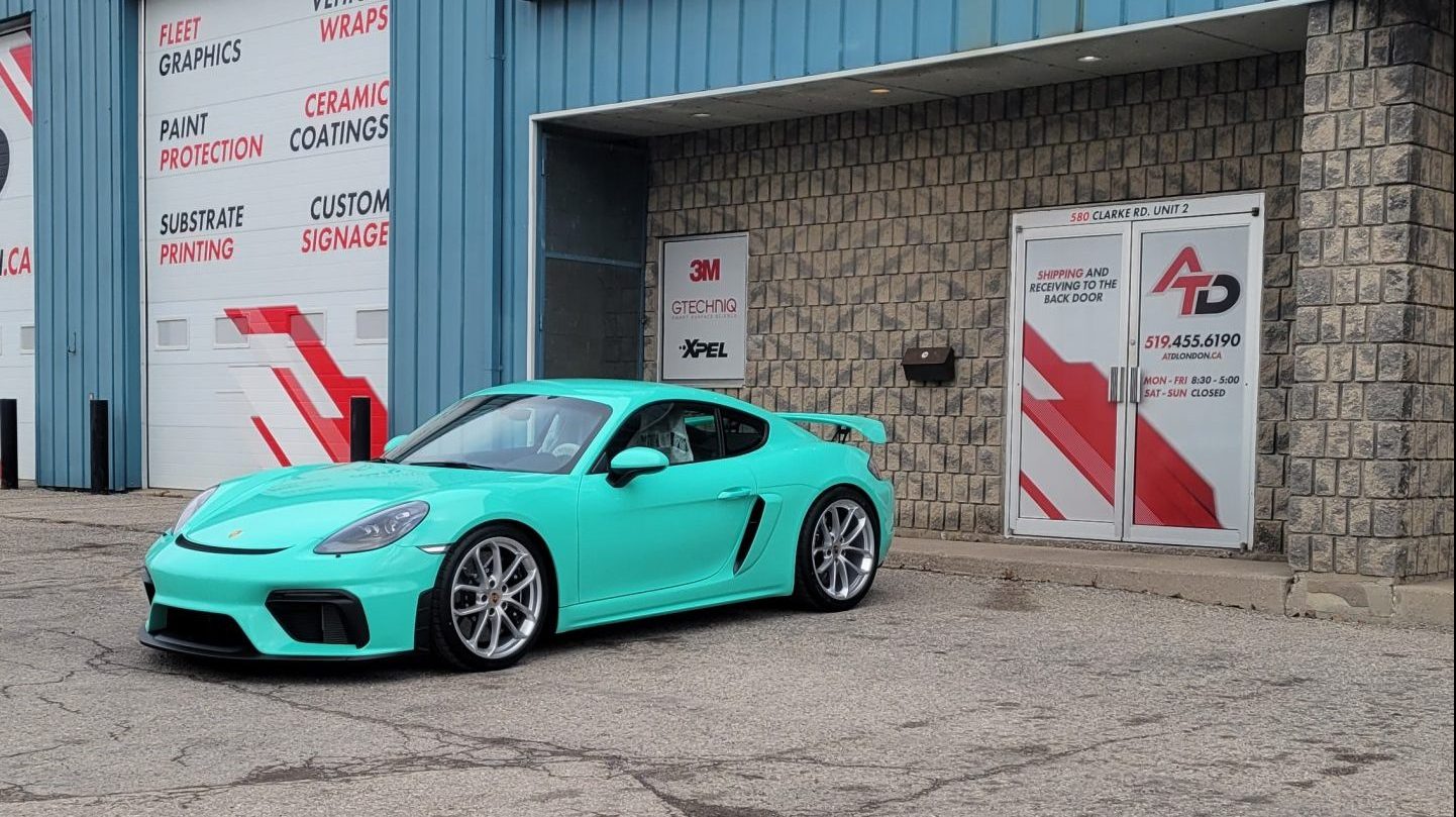 Mint green Porsche 718 Cayman GT4 colour-change wrap
