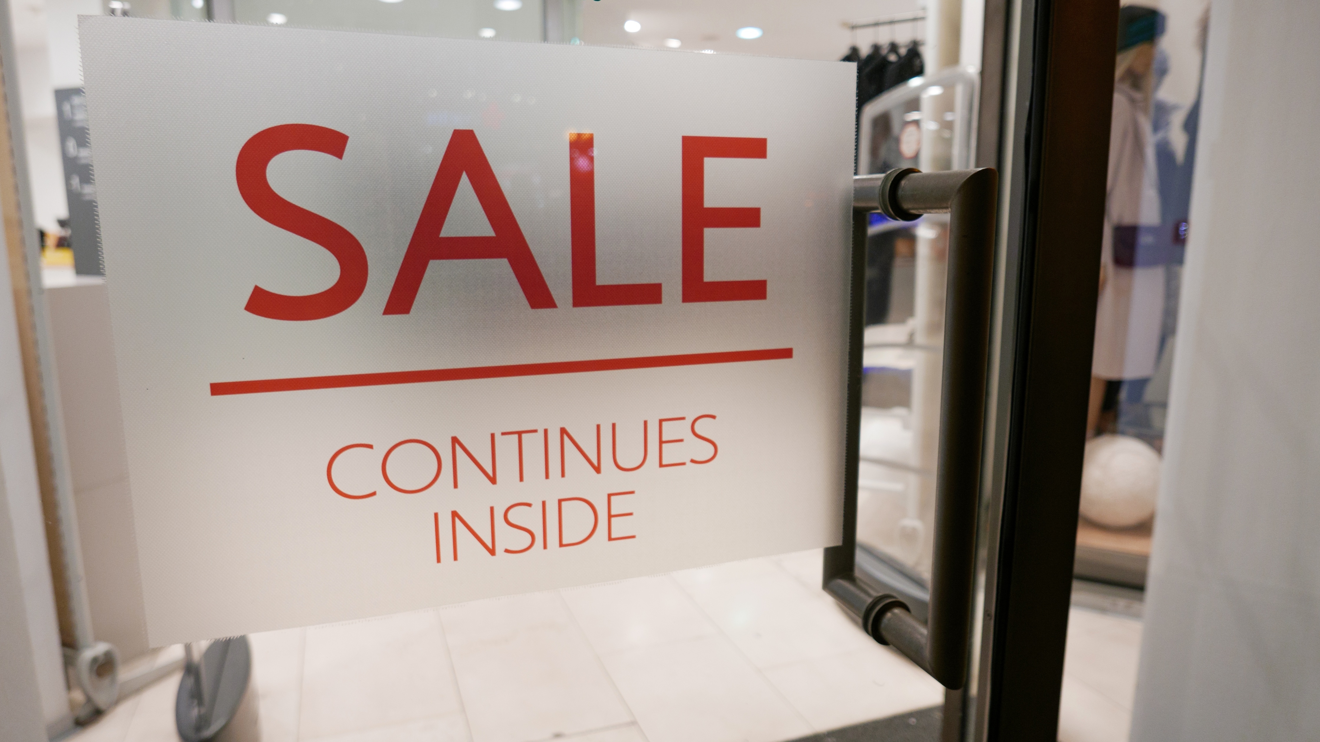 Printed window graphic on a storefront door
